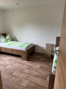 Postel nebo postele na pokoji v ubytování Ferienwohnung Zeitler