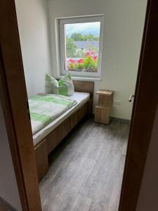 Postel nebo postele na pokoji v ubytování Ferienwohnung Zeitler
