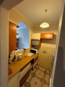a kitchen with a counter top and a microwave at Żeromskiego 2024 in Gdynia