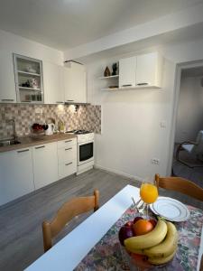 Kuchyň nebo kuchyňský kout v ubytování Apartman Laura