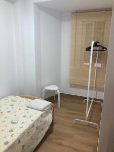 Posteľ alebo postele v izbe v ubytovaní LA PEPITA