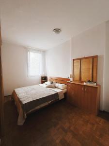 Postel nebo postele na pokoji v ubytování LEJLA apartment