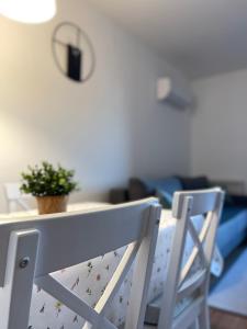 Postel nebo postele na pokoji v ubytování Apartman Luni