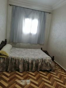 Postel nebo postele na pokoji v ubytování Casa Hicham