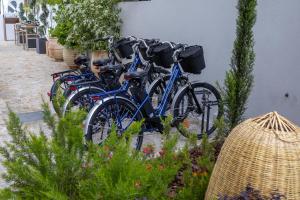 a group of bikes parked next to a building at VISEU EXECUTIVE Hotel in Viseu