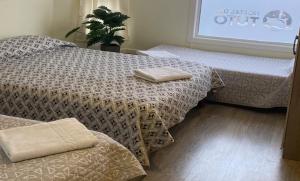 Voodi või voodid majutusasutuse Hostal Del Tuto toas