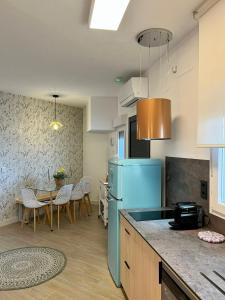 Η κουζίνα ή μικρή κουζίνα στο Piso céntrico helicóptero