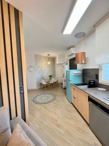 Η κουζίνα ή μικρή κουζίνα στο Piso céntrico helicóptero +23 φωτογραφίες