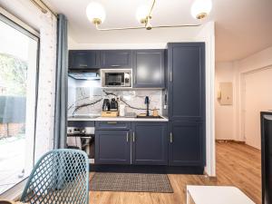 Η κουζίνα ή μικρή κουζίνα στο Appartement cocooning en centre-ville - Résidence le Colisée
