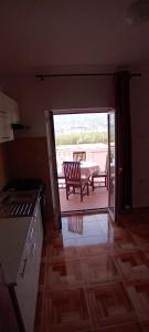 Η κουζίνα ή μικρή κουζίνα στο Apartmani Peko 5