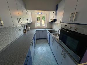 Kuchyň nebo kuchyňský kout v ubytování Apartments Prosika