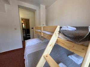 Postel nebo postele na pokoji v ubytování Apartments Prosika