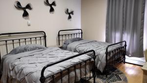 Postel nebo postele na pokoji v ubytování Pack Train Inn