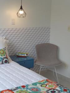 Cama ou camas em um quarto em Casa Estrela do Mar