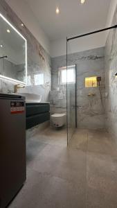 Ένα μπάνιο στο Villa Mr.H