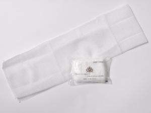 a white shower curtain with a roll of toilet paper at APA Hotel Nambaminami Daikokucho Ekimae in Osaka