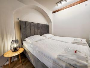Postel nebo postele na pokoji v ubytování Apartmány Rangifer