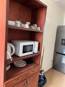 Cuina o zona de cuina de Résidence Vridi Cité 4 fotos més