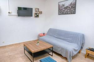 TV a/nebo společenská místnost v ubytování Le Man Nima
