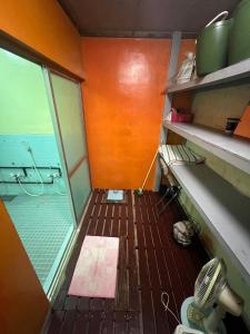 an inside view of a room with a window at やどバンブー in Hateruma