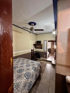 Postel nebo postele na pokoji v ubytování Copa de Oro Hotel Boutique