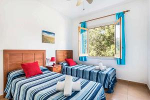Postel nebo postele na pokoji v ubytování Villa Truvi + 21 fotografií