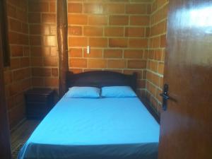 Postel nebo postele na pokoji v ubytování Chácara Rancho do Lago + 32 fotografií