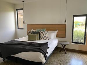 Una cama o camas en una habitación de Villa Rochford