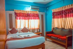 Ένα ή περισσότερα κρεβάτια σε δωμάτιο στο Hotel Middle Point Pvt Ltd