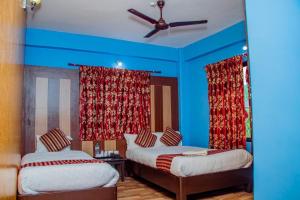 Ένα ή περισσότερα κρεβάτια σε δωμάτιο στο Hotel Middle Point Pvt Ltd