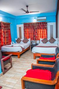 Ένα ή περισσότερα κρεβάτια σε δωμάτιο στο Hotel Middle Point Pvt Ltd