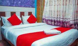 Ένα ή περισσότερα κρεβάτια σε δωμάτιο στο Hotel Middle Point Pvt Ltd
