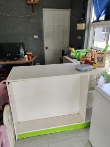 Kuchyň nebo kuchyňský kout v ubytování บ้านชลาลัย