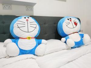 Katil atau katil-katil dalam bilik di Larkin bus terminal Doraemon Home by YHA