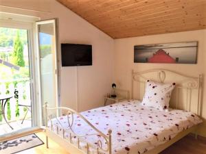 Postel nebo postele na pokoji v ubytování B&B Mon Rêve, Petit déjeuner BIO, Jacuzzi