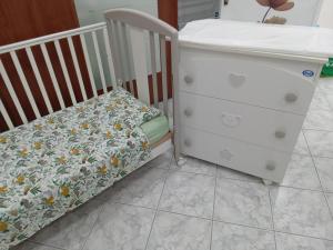 Ένα ή περισσότερα κρεβάτια σε δωμάτιο στο Casa Ines