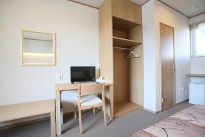 TV a/nebo společenská místnost v ubytování Family Stay Tsukuba Room