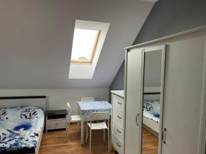 Postel nebo postele na pokoji v ubytování Relax u Agi i Jurka