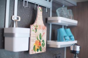 a bottle of juice hanging from a kitchen counter at Sienna Ambassador Residence in Busan +75 photos