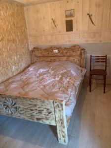 Postel nebo postele na pokoji v ubytování Guesthouse Aprasidze