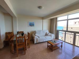 Posezení v ubytování Gran apartamento frente al mar mijas