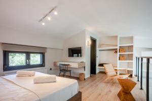 Postel nebo postele na pokoji v ubytování Thalos Luxury Living I