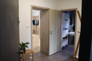 Letto o letti in una camera di Apartmány B. Němcové