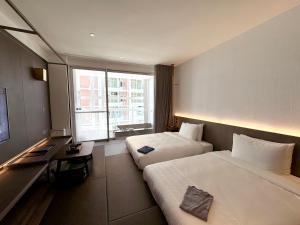 Televisyen dan/atau pusat hiburan di Orient Luxury Hotel-Jiaoxi