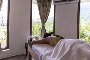 Letto o letti in una camera di Mountain Glory Forest Resort