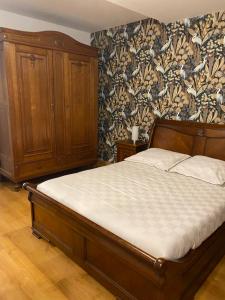 Łóżko lub łóżka w pokoju w obiekcie La Chambre d'Angèle