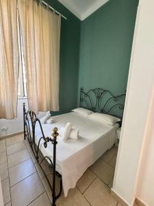Postel nebo postele na pokoji v ubytování GARIBALDI ROOMS