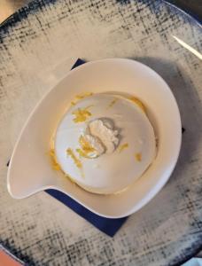 a white bowl with some food inside of it at Albergo La Conca Azzurra in Conca dei Marini
