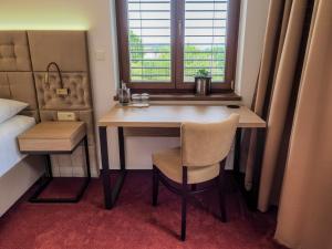 Postel nebo postele na pokoji v ubytování Hotel Cvilín