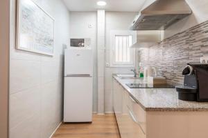 Kuchyňa alebo kuchynka v ubytovaní Fira Barcelona Apartment
